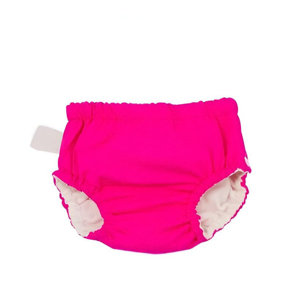 Culotte d'apprentissage verte pour bébé avec élastique à la taille et aux cuisses. Intérieur blanc doux. Vêtement confortable pour l'apprentissage de la propreté.