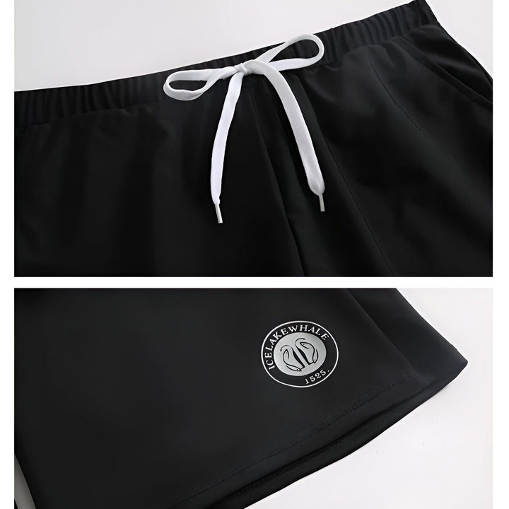 Ensemble de sport noir pour homme comprenant un haut à manches longues, un short de bain avec cordon de serrage et un legging long. Idéal pour la natation, le surf et autres activités aquatiques.