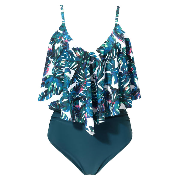 Image d'une femme portant un maillot de bain deux pièces vert turquoise. Le haut est à motifs de feuilles tropicales bleues, vertes et roses avec des volants, tandis que le bas est taille haute et uni. Idéal pour la plage ou la piscine.