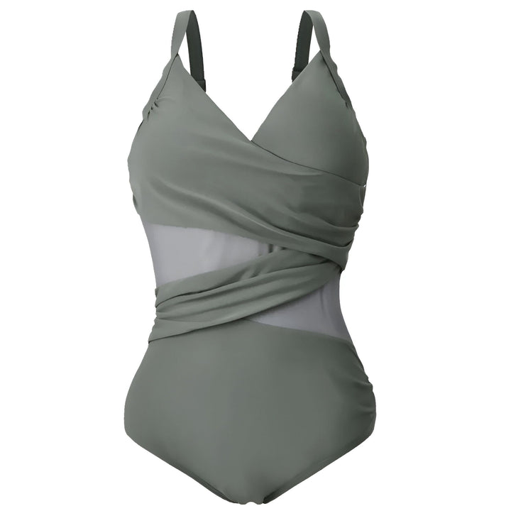 Maillot de bain une pièce bleu électrique, drapé croisé à l'avant, découpé en maille transparente sur les côtés, bretelles larges. Mode été, prêt pour la plage.