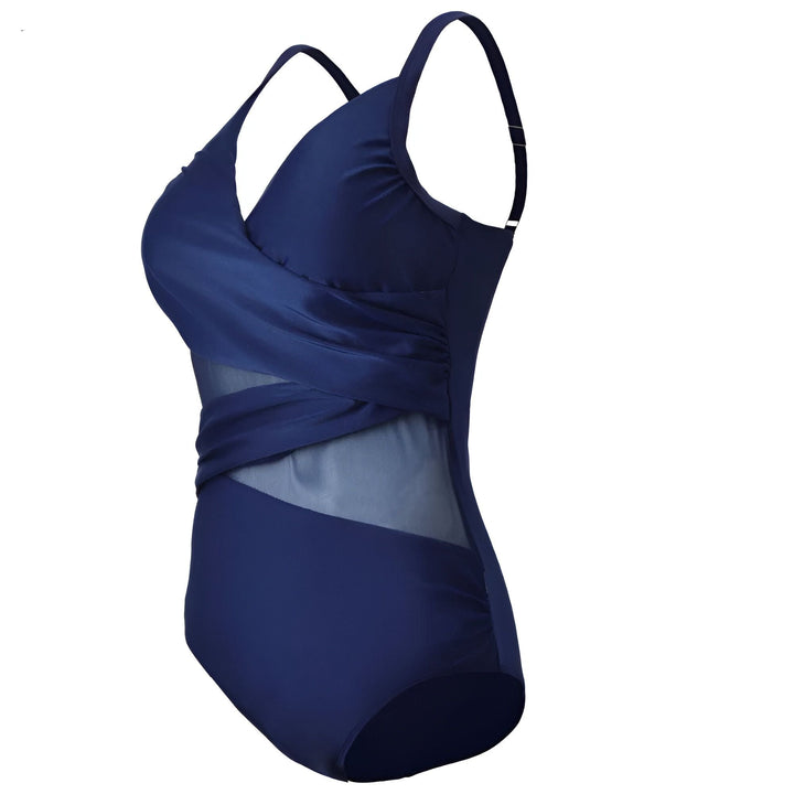 Maillot de bain une pièce bleu vif avec bretelles. Design croisé à l'avant avec des détails en maille transparente sur les côtés. Idéal pour la plage ou la piscine. Mode été.