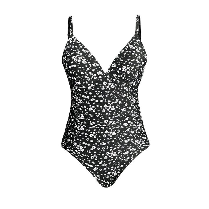 Dos d'un maillot de bain une pièce noir à imprimé floral blanc, avec des bretelles fines. Idéal pour la plage ou la piscine. Mode estivale féminine et élégante.