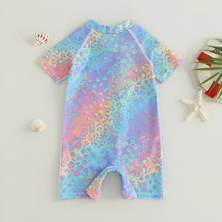 Combinaison de bain colorée pour enfant avec motif léopard, fermeture éclair rose, manches courtes. Idéale pour la piscine ou la plage, protection solaire. Vêtement de sport aquatique pour filles.