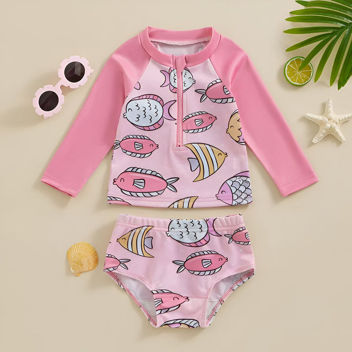 Maillot de bain rose pour enfants avec fermeture éclair et motif de poissons mignons.