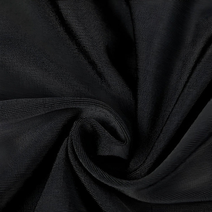 Homme portant un cuissard de cyclisme noir, marque BALEAF visible. Vêtement de sport moulant, idéal pour le cyclisme ou la course. Coupe athlétique et confortable.