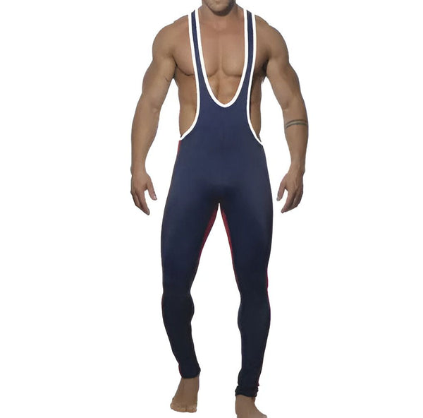 Homme musclé de dos portant une combinaison moulante bleu marine et rouge, idéale pour la danse, le sport ou la gymnastique. Vêtement confortable avec une coupe près du corps.