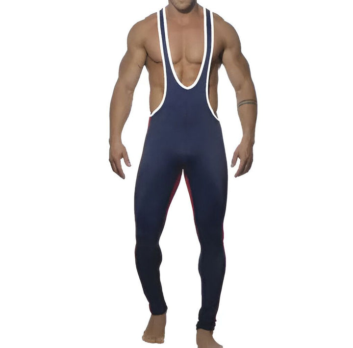 Homme musclé de dos portant une combinaison moulante bleu marine et rouge, idéale pour la danse, le sport ou la gymnastique. Vêtement confortable avec une coupe près du corps.