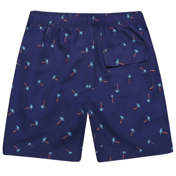 Short de bain bleu marine avec motifs de palmiers turquoise et orange. Détails : cordon orange à la taille, poche latérale, doublure en maille, tissu imperméable. Idéal pour la plage ou la piscine.