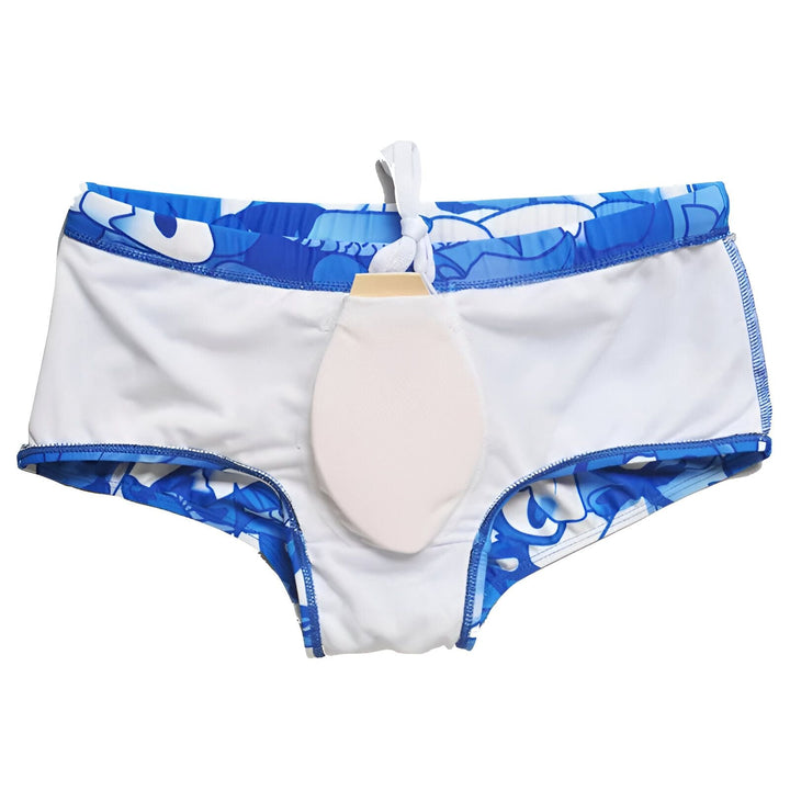 Culotte de maillot de bain pour femme, imprimé floral bleu et blanc avec motif de poisson sur le haut. Style tendance pour l'été, idéal pour la plage ou la piscine.