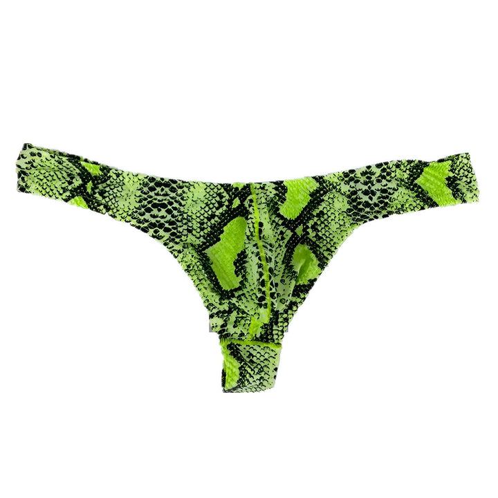 Culotte tanga motif peau de serpent vert vif et noir sur fond blanc. Sous-vêtement féminin tendance.